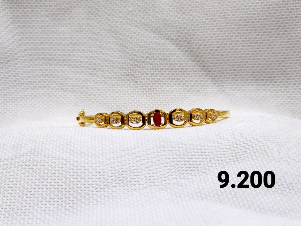 Aurelia Ruby Accent Stone Gold Bangle