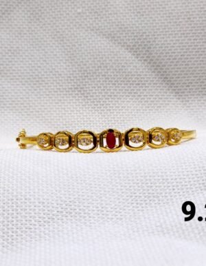 Aurelia Ruby Accent Stone Gold Bangle