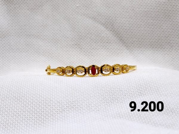Aurelia Ruby Accent Stone Gold Bangle
